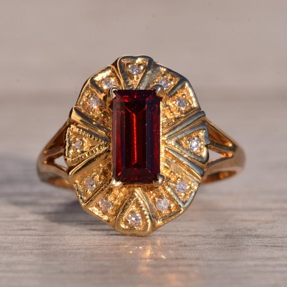 Contemporary Garnet and Natural Diamond Ring in Yellow Gold